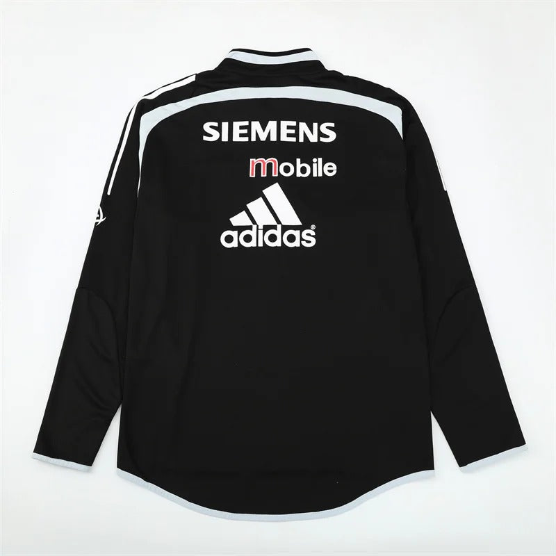 Camiseta retro de entrenamiento negra de manga larga con media cremallera del Real Madrid 2004/05