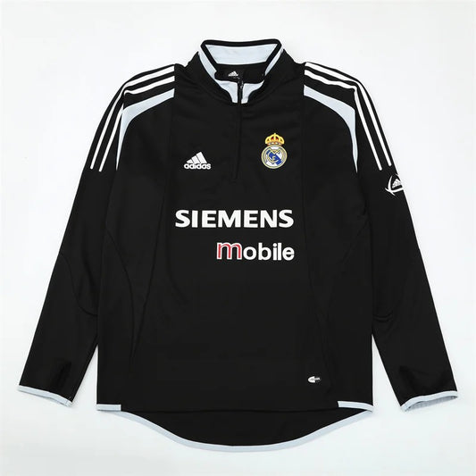 Camiseta retro de entrenamiento negra de manga larga con media cremallera del Real Madrid 2004/05