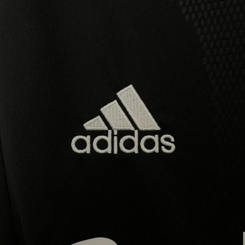 Camiseta retro de visitante del Real Madrid 2001/2002 edición fan